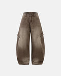 Brown acid wash barrel jeans by Flation featuring a relaxed fit, distressed details, and vintage-inspired streetwear style.