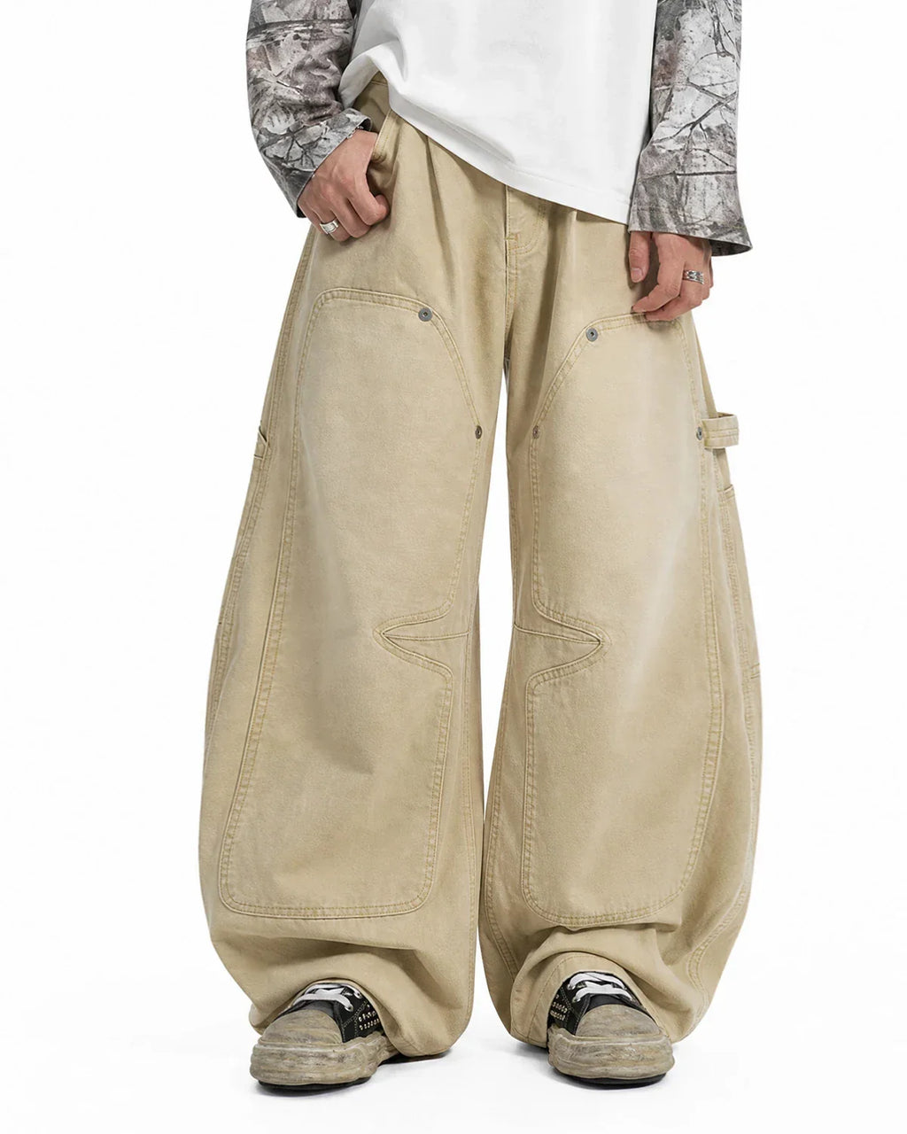 Washed barrel cargo pants by INFLATION, streetwear style with large pockets and relaxed fit, shown in a natural fabric appearance.
