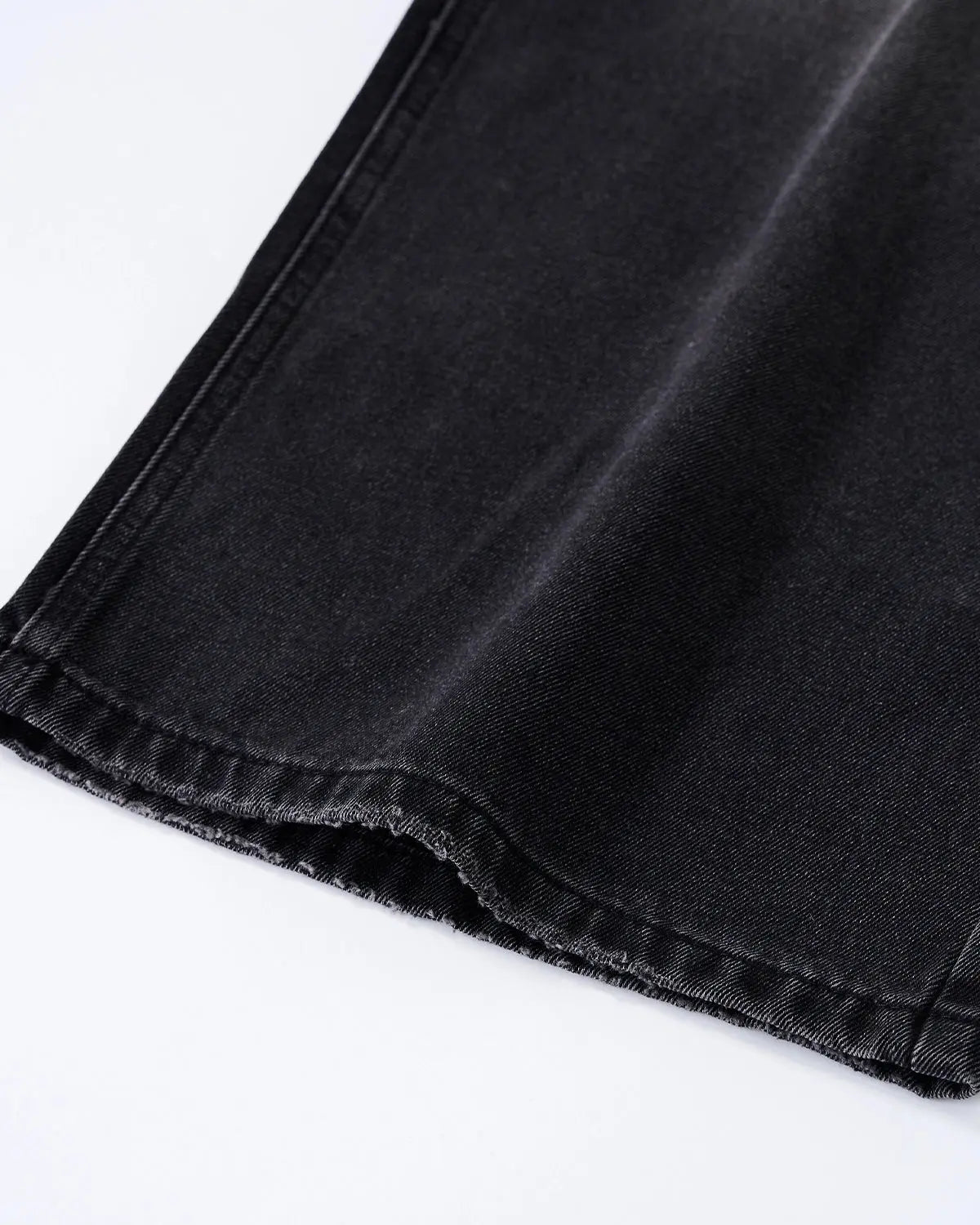 Distressed rhinestone ripped baggy jeans from Inflation Streetwear with rhinestone details and a relaxed, oversized fit.