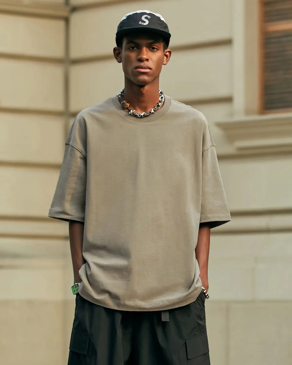 InflationUS heavyweight cotton oversized T-shirt in black, featuring a relaxed fit and bold streetwear style.