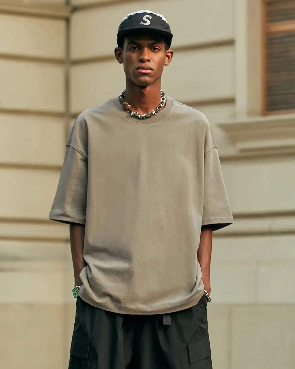 InflationUS heavyweight cotton oversized T-shirt in black, featuring a relaxed fit and bold streetwear style.