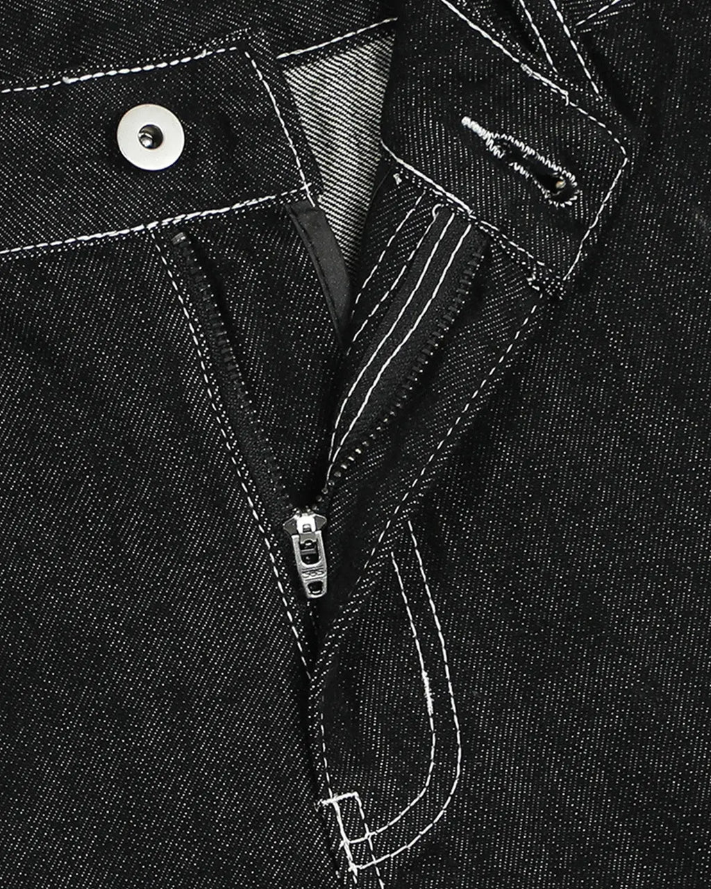 Raw denim cargo longline shorts by INFLATION, featuring multiple pockets, distressed details, and a relaxed fit on pants.
