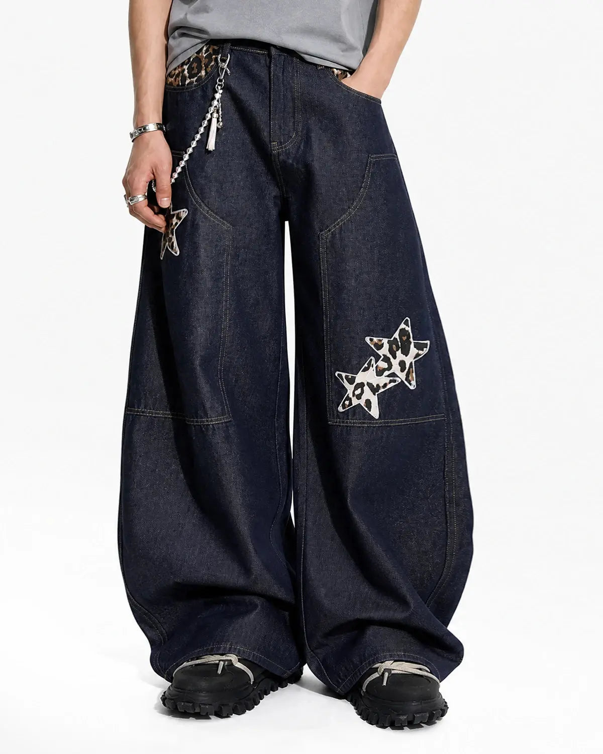 Inflation Streetwear leopard star patch barrel jeans with stylish leopard and star patches on denim, relaxed fit, casual streetwear style.