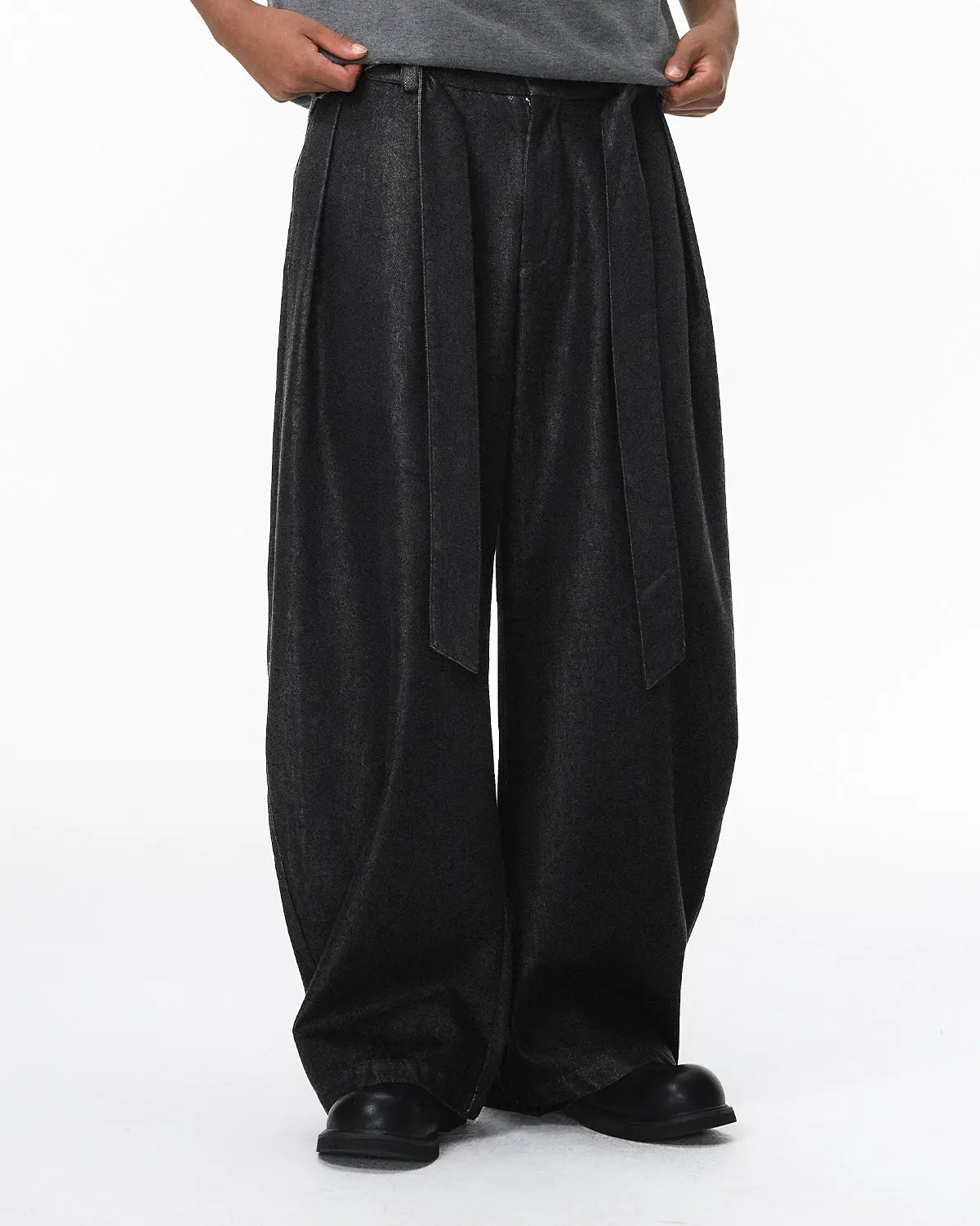 Raw silky denim jeans with belt from Flation streetwear, featuring a relaxed fit and stylish design.