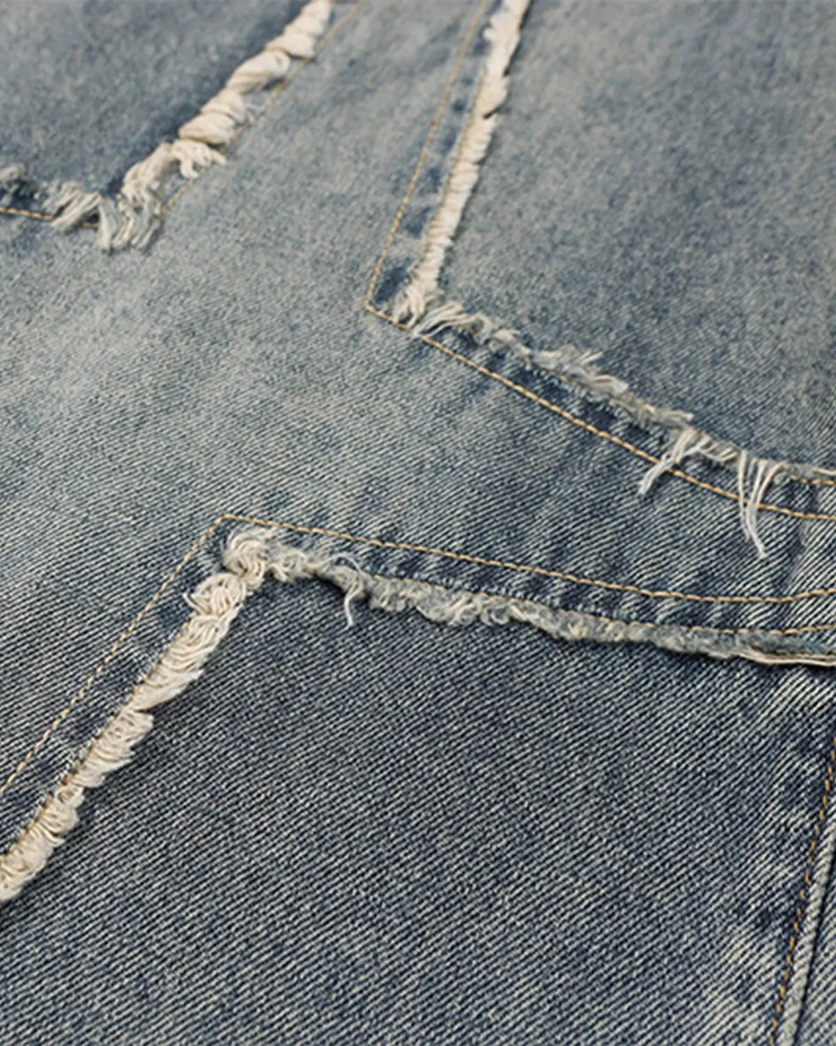 Star patched baggy jeans by Flation Streetwear featuring distressed denim and relaxed fit with star patch details.