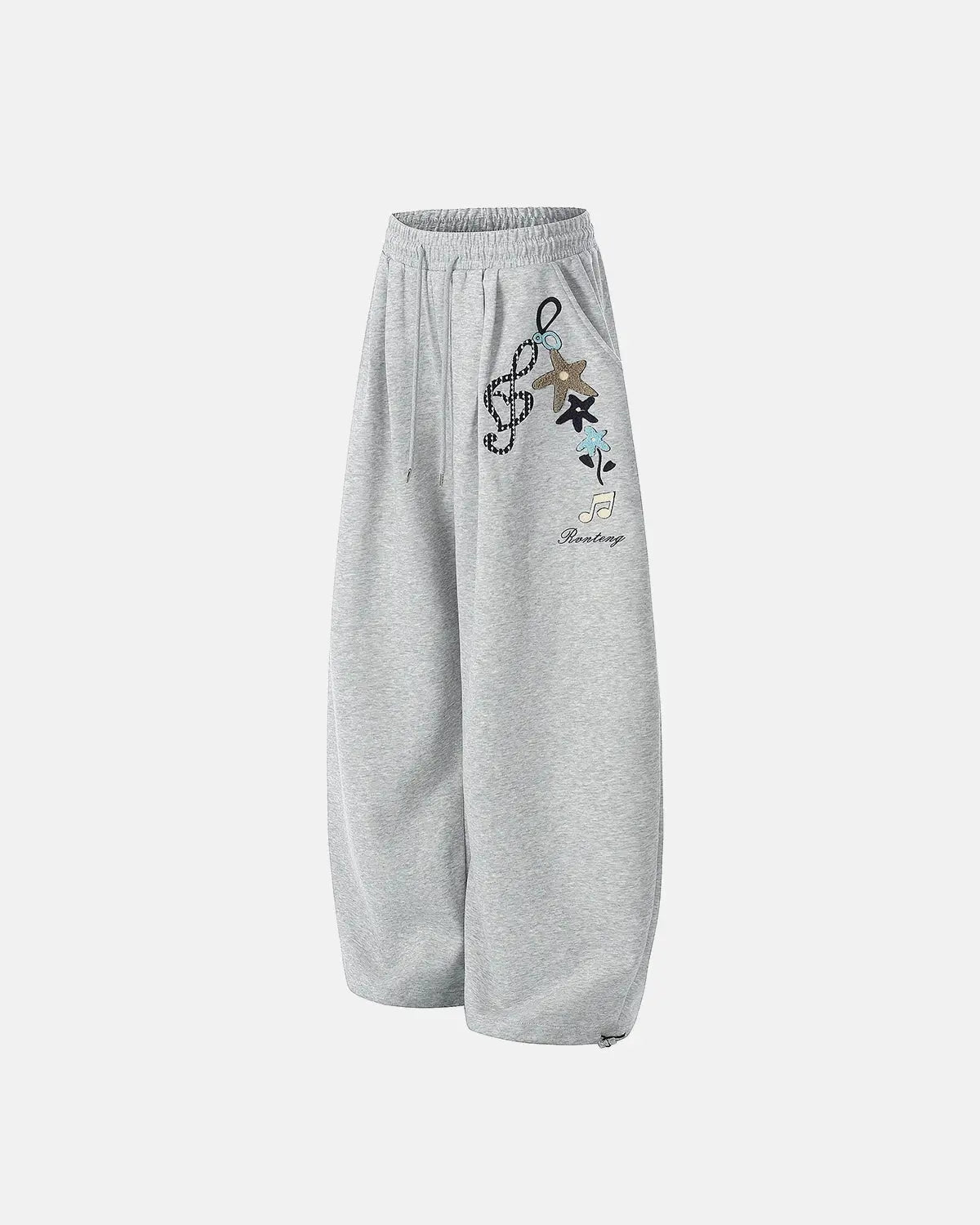 Inflation Streetwear Applique Baggy Sweatpants in neutral color, featuring oversized fit and stylish applique details.