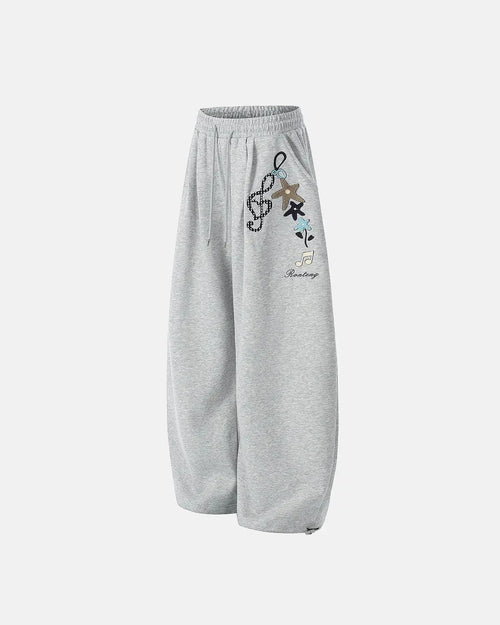 Inflation Streetwear Applique Baggy Sweatpants in neutral color, featuring oversized fit and stylish applique details.