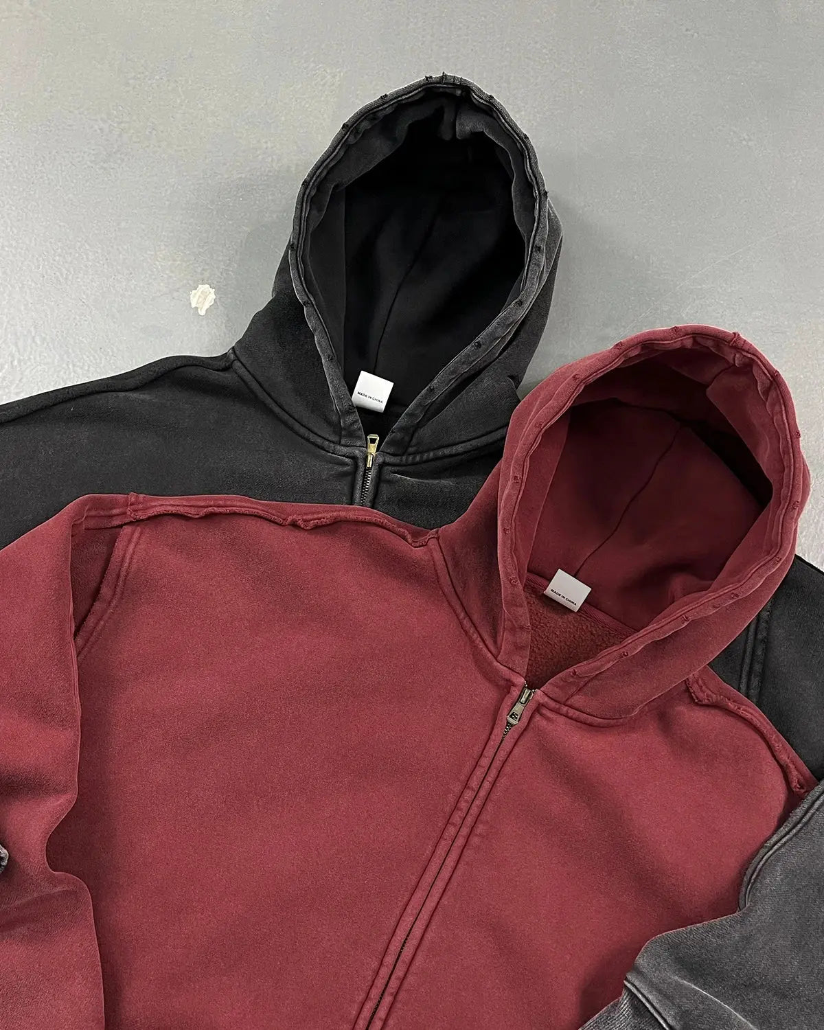 Distressed acid wash double zip hoodie from Flation Streetwear featuring a rugged, vintage-inspired design with double zippers.