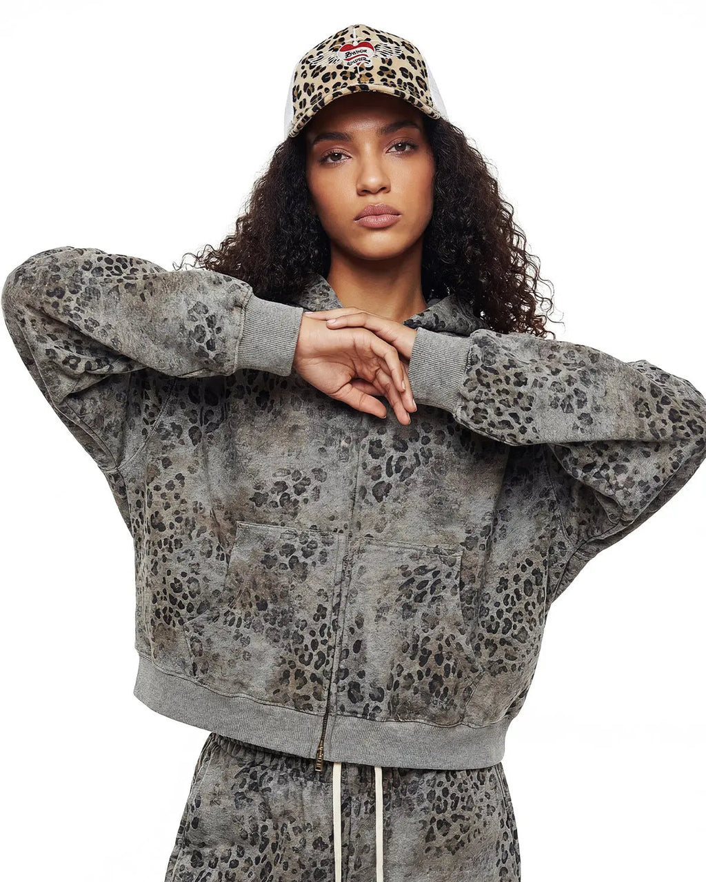 Leopard print boxy zip-up hoodie from Inflation Streetwear featuring a front zipper and relaxed fit.