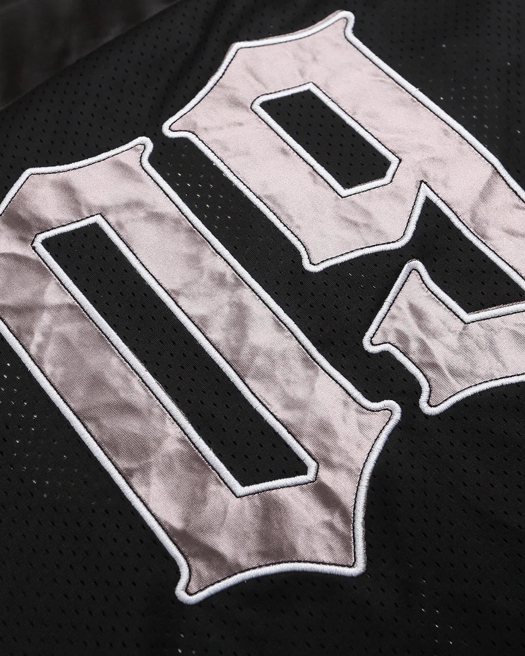 Black Gothic embroidered mesh jersey T-shirt by INFLATION with intricate embroidery and sheer mesh fabric, stylish streetwear design.