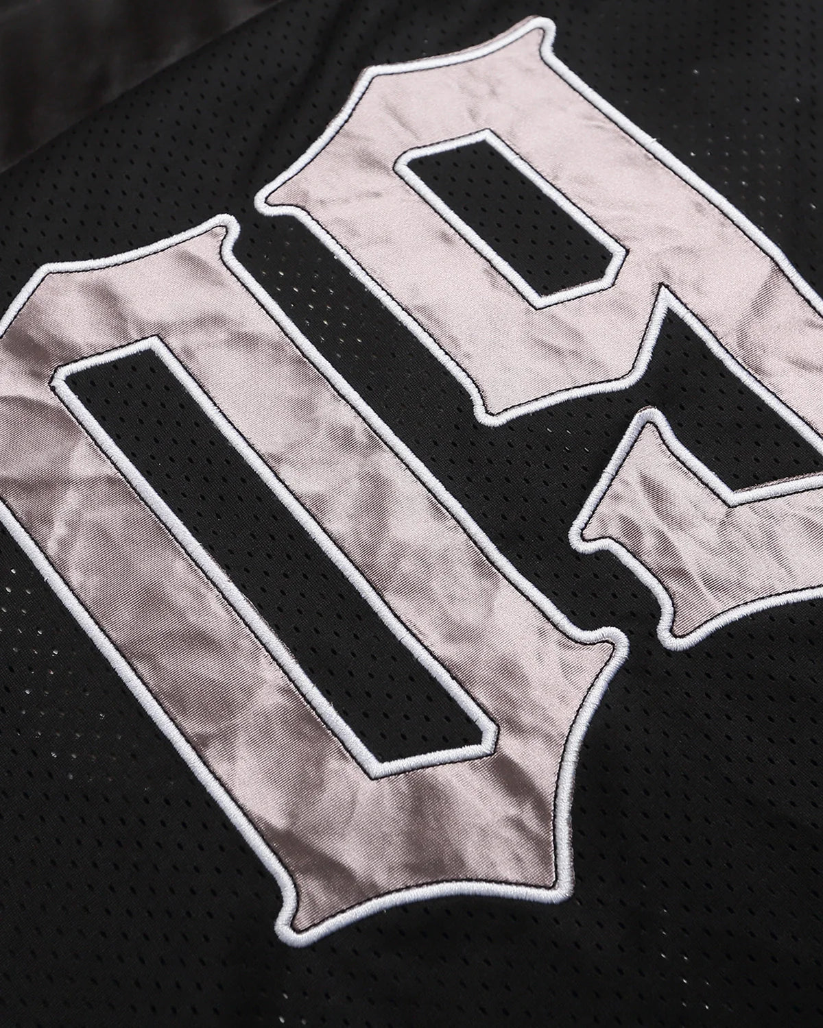 Black Gothic embroidered mesh jersey T-shirt by INFLATION with intricate embroidery and sheer mesh fabric, stylish streetwear design.