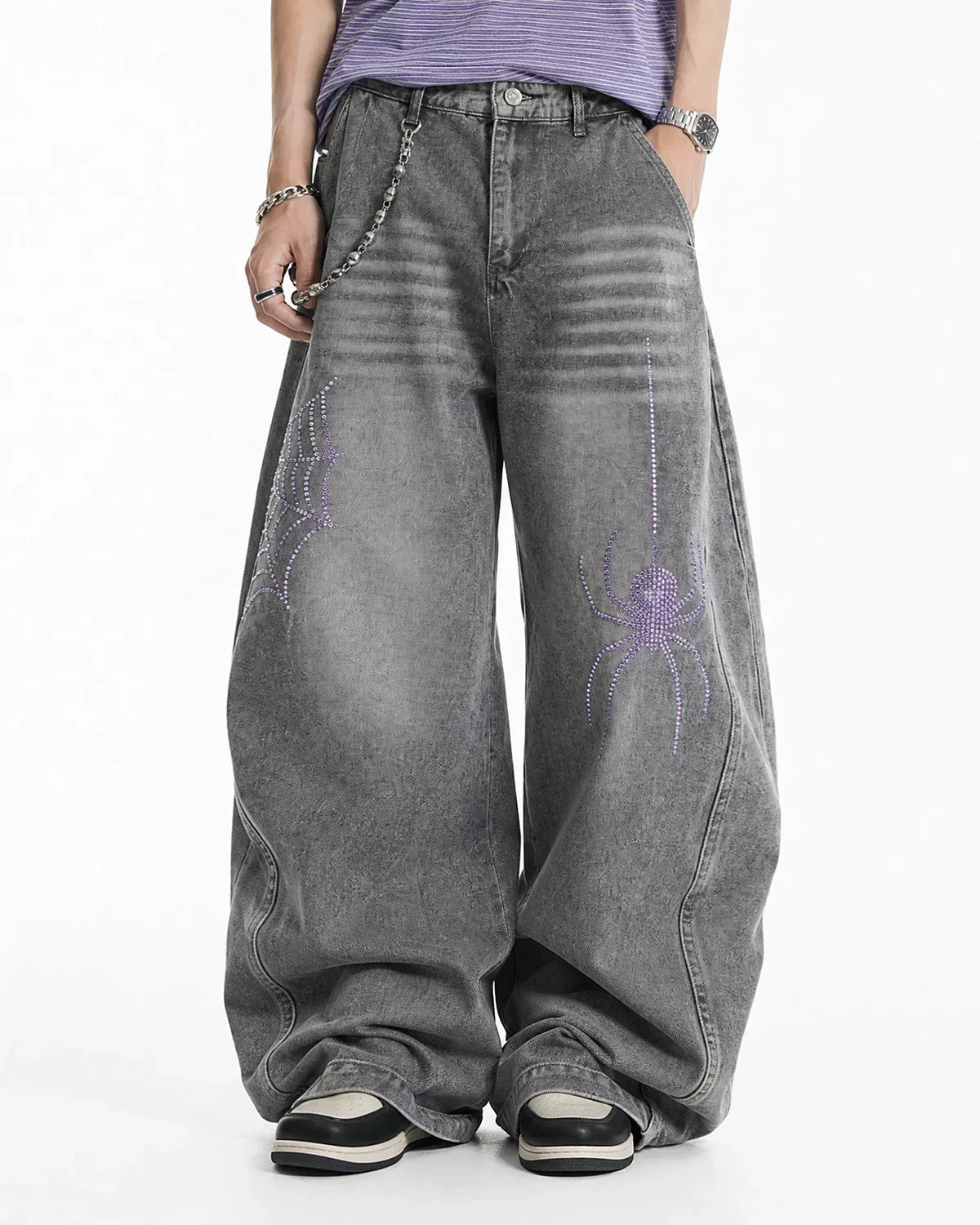 Flation Spider Graphic Rhinestone Barrel Jeans showing dark denim pants with spider and rhinestone embellishments, stylish streetwear.