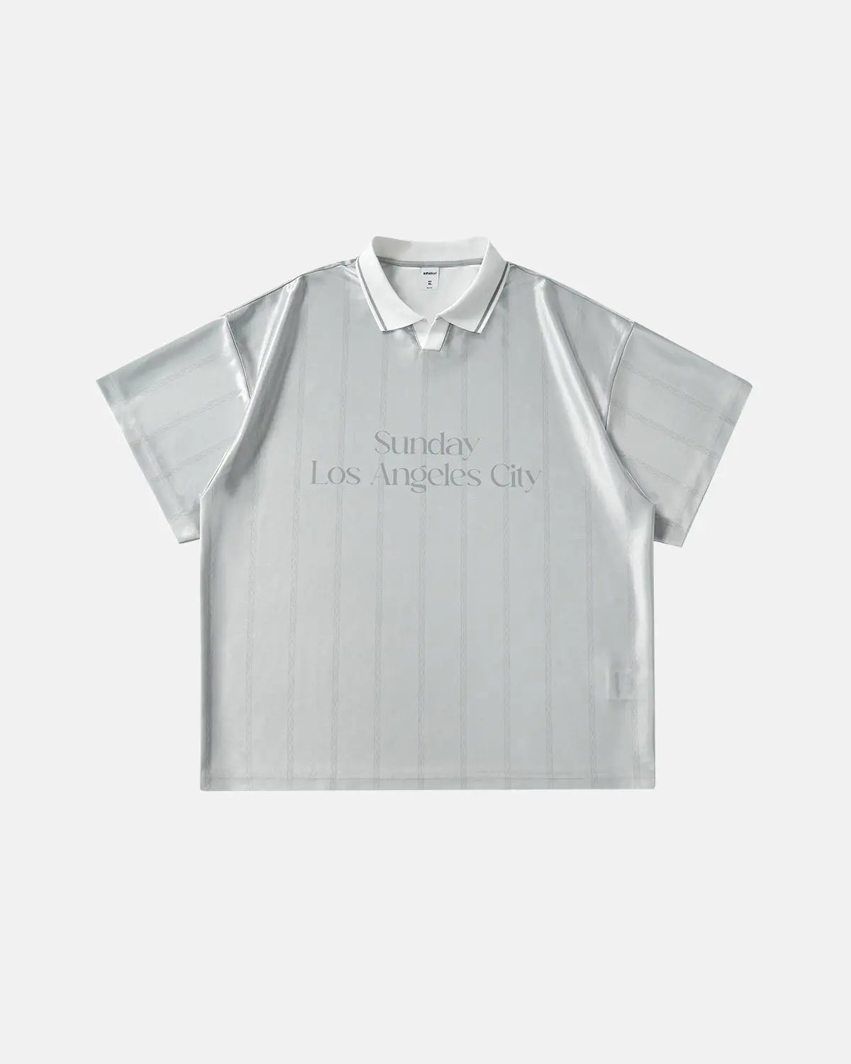 Vintage striped polo jersey by INFLATION featuring classic polo collar, bold stripes, and a relaxed fit for streetwear style.