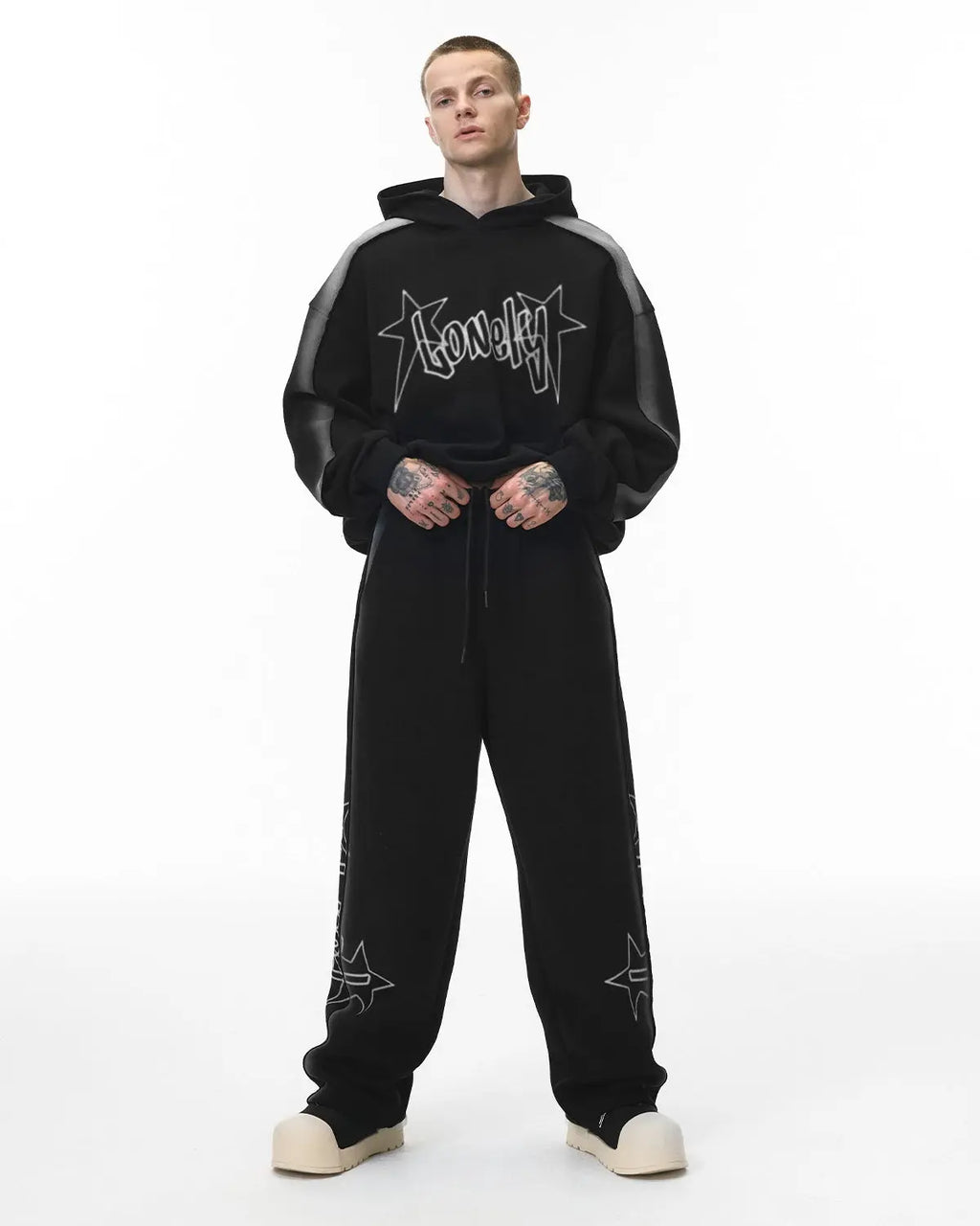 Flation stitching spray-painted hoodie featuring vibrant, artistic designs on a casual streetwear hoodie.