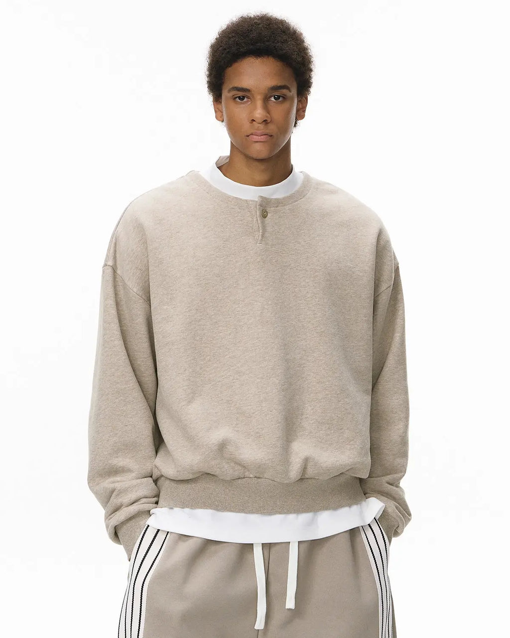 Boxy fit Henley collar sweatshirt by Flation Streetwear, shown in a casual, relaxed fit with long sleeves and a Henley neckline.