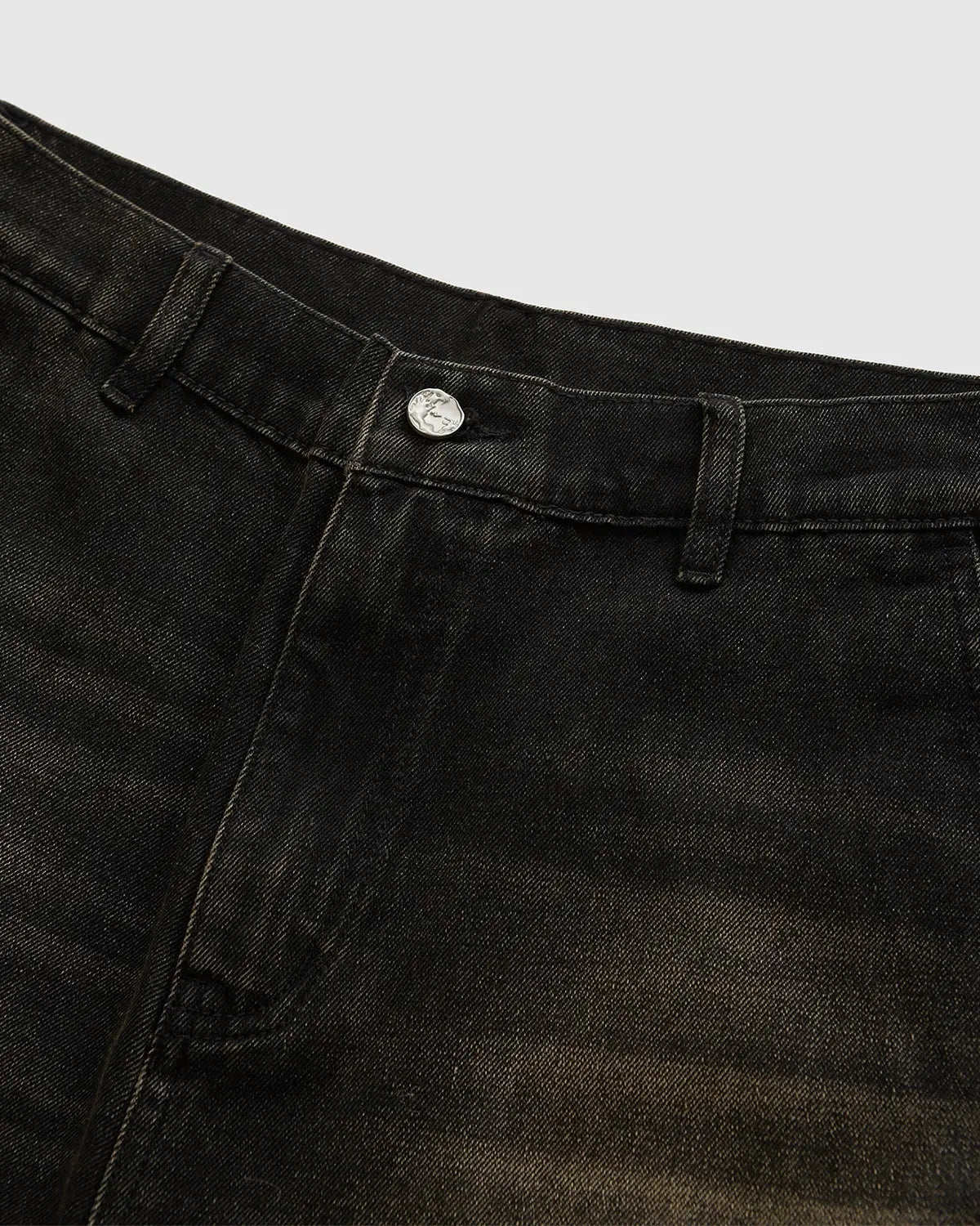 Retro washed Flation Jorts denim jeans with a relaxed fit and vintage style, displayed on a plain background.