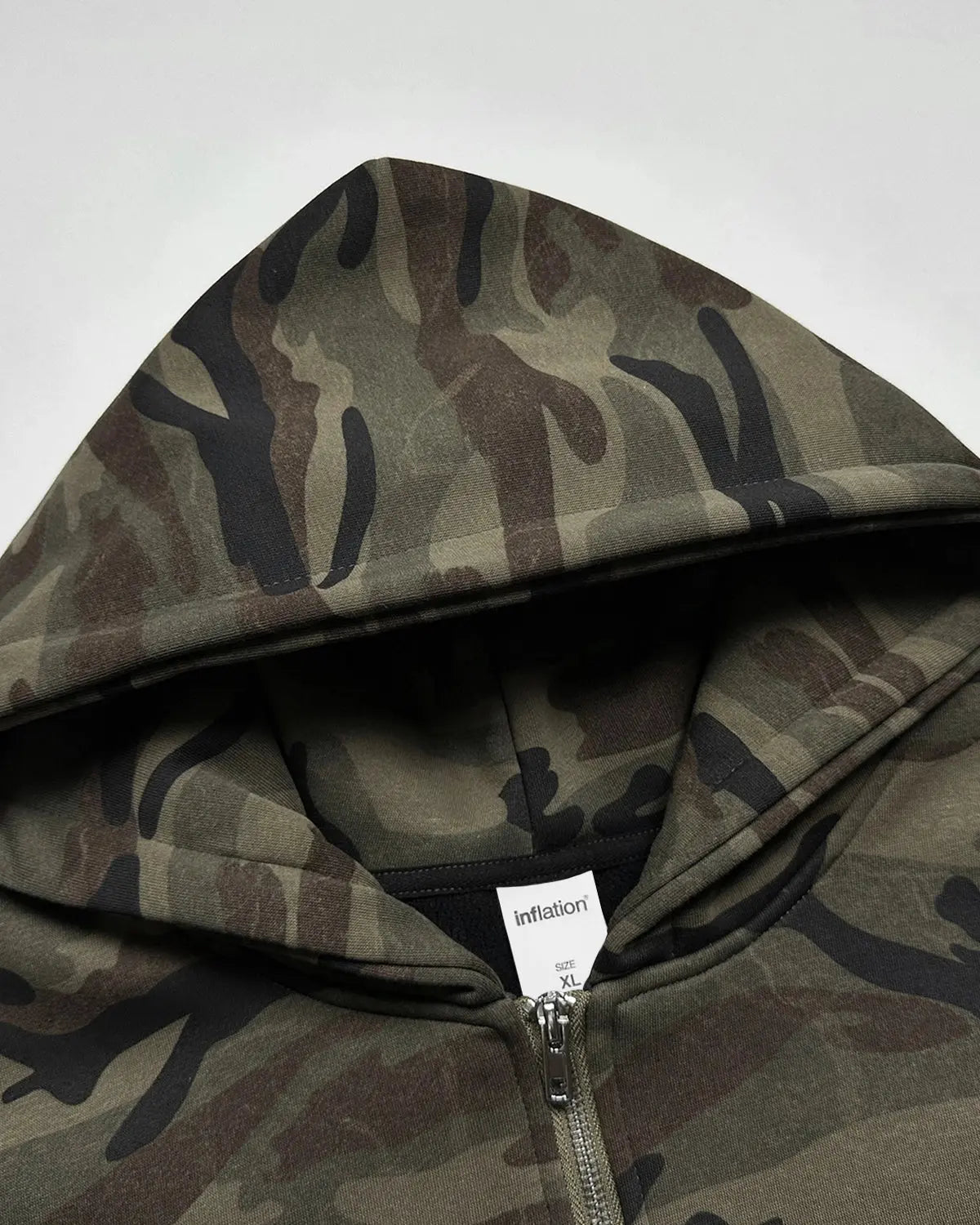 Inflation Streetwear 69 Applique Embroidery camo zip-up hoodie featuring bold applique design and adjustable hood.