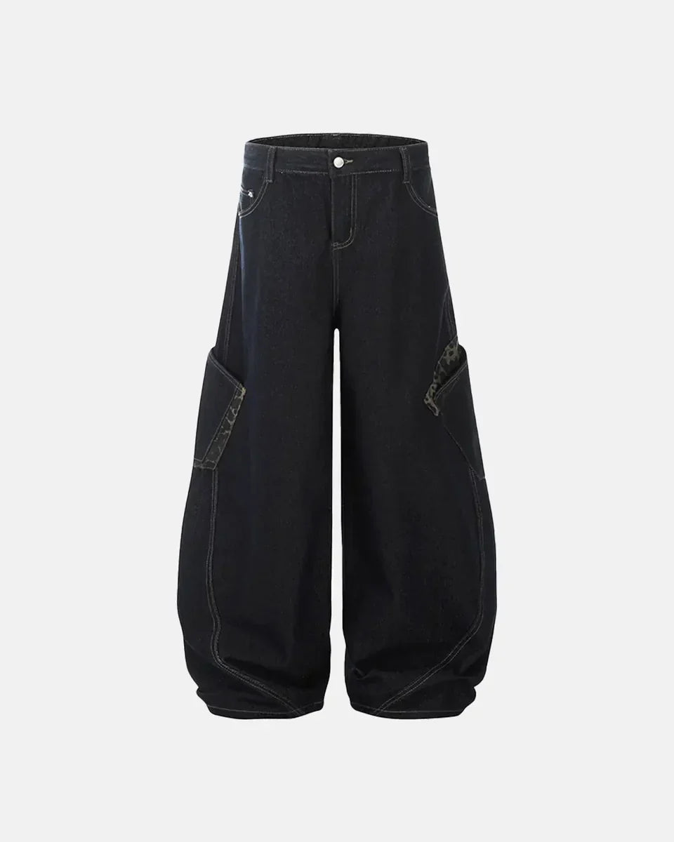 Leopard patchwork barrel jeans by Flation Streetwear featuring bold leopard print and relaxed fit style.