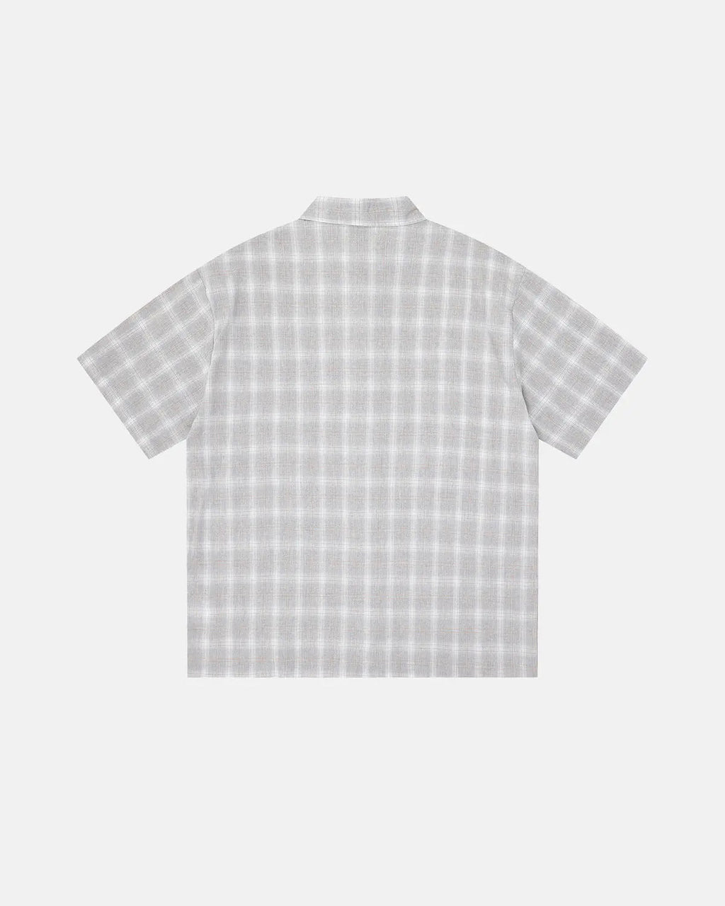 Inflation Streetwear plaid sticker graphic studded shirt featuring a bold plaid pattern and studded accents on a casual shirt.