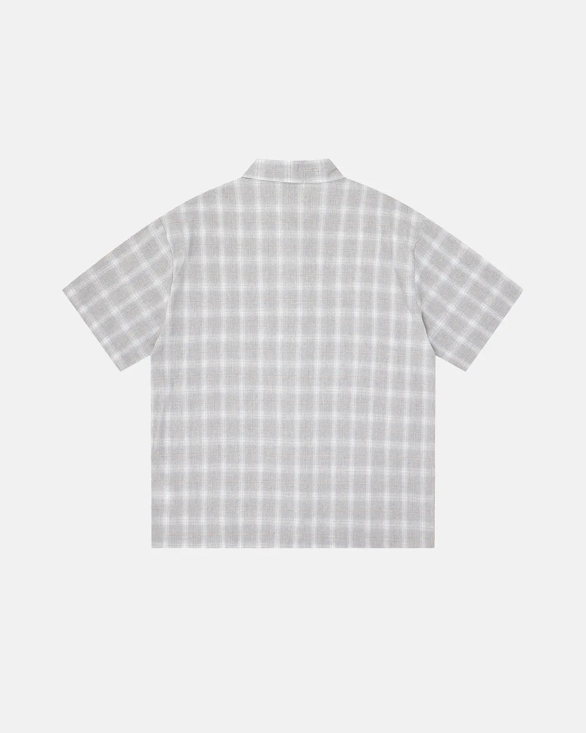 Inflation Streetwear plaid sticker graphic studded shirt featuring a bold plaid pattern and studded accents on a casual shirt.