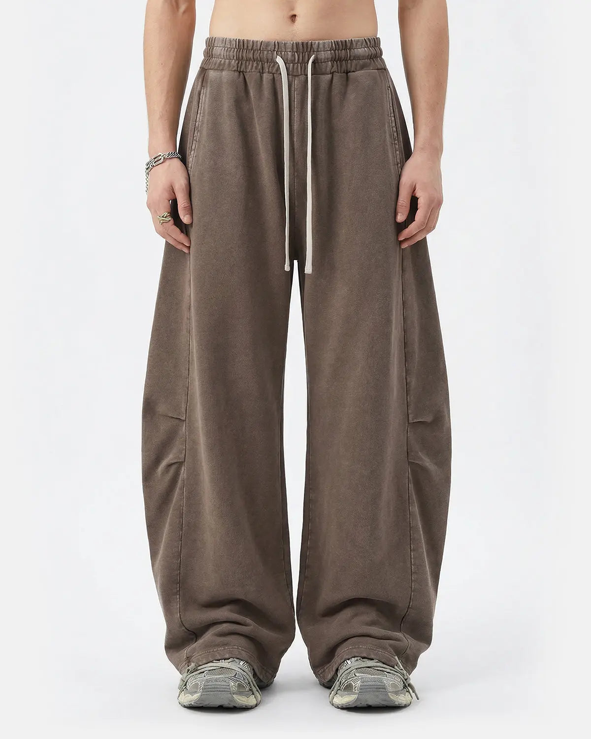Distressed acid washed barrel sweatpants by INFLATION Streetwear, showcasing a relaxed fit with worn, vintage-style detailing.