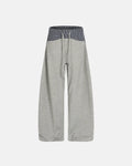Inflation Streetwear plaid layered baggy sweatpants with a relaxed fit and layered design in a classic plaid pattern.