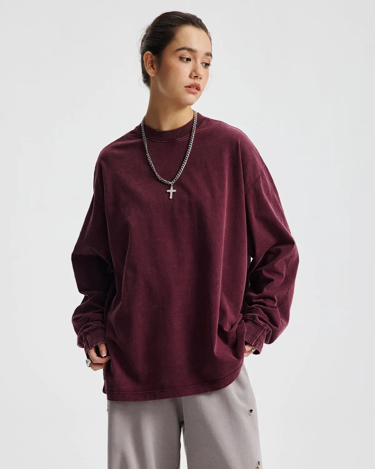Flation distressed acid wash oversized long sleeve tee with a relaxed fit, featuring a worn-in, vintage-inspired style.