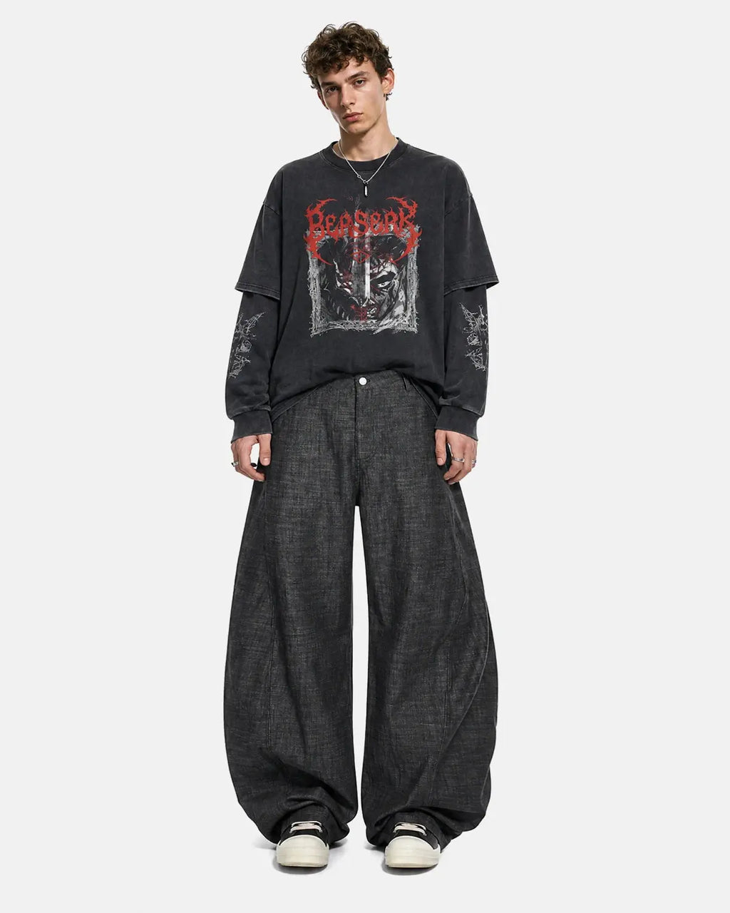 Lightweight raw barrel jeans by INFLATION featuring a relaxed fit and raw denim finish, displayed on a model.