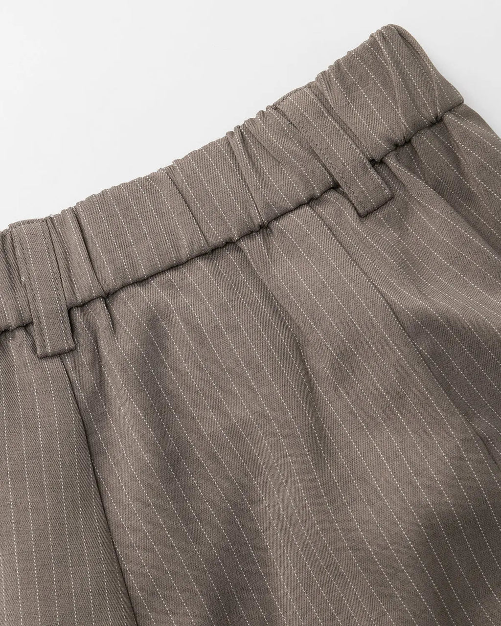 INFLATION pinstripe pleated tailored shorts, stylish pants with vertical stripes and a high-waisted fit, perfect for streetwear fashion.
