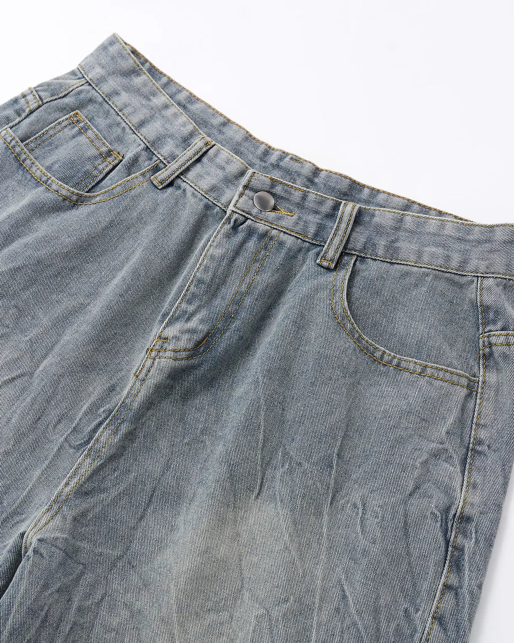 Textured washed longline jorts from INFLATION Streetwear, showcasing their casual fit and distressed denim style.