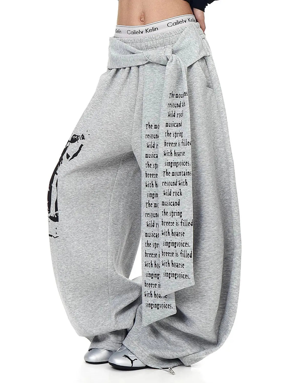 Inflation Streetwear graphic printing baggy sweatpants with bold design, relaxed fit, and streetwear style in black and white.