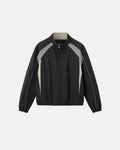 Reflective Flation windbreaker track jacket with streetwear style, featuring a sleek design and reflective detailing.