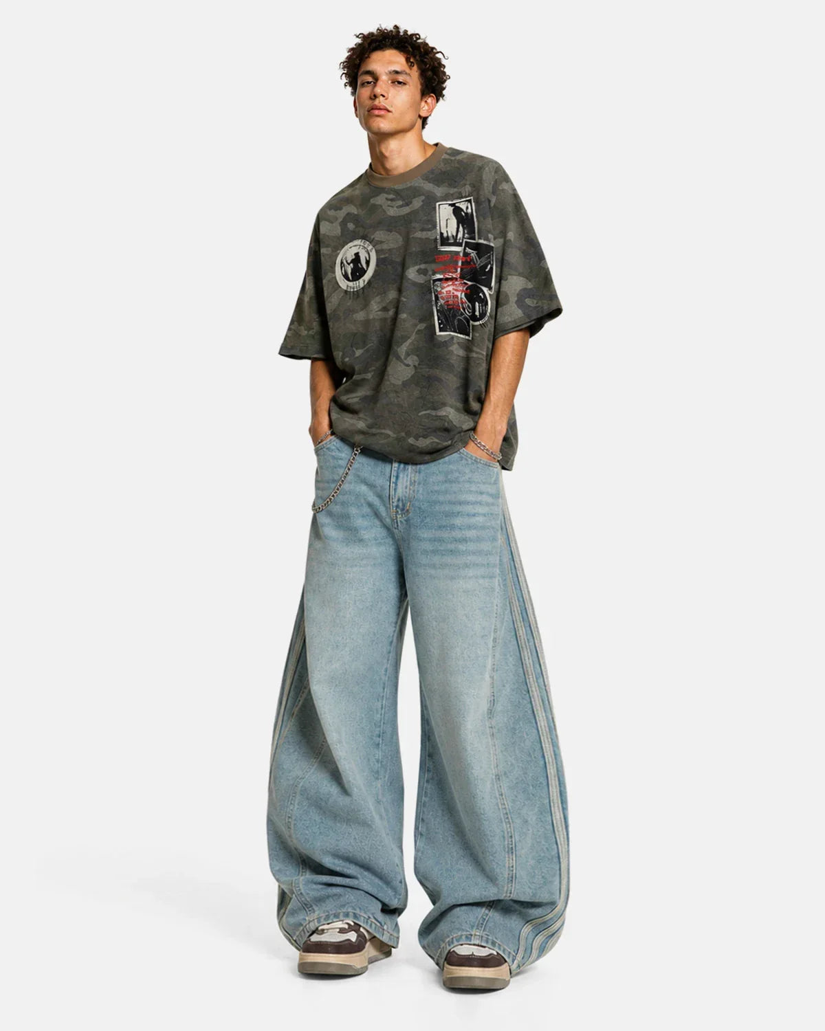 Acid wash striped side baggy jeans by INFLATION featuring relaxed fit, distressed details, and bold streetwear style.