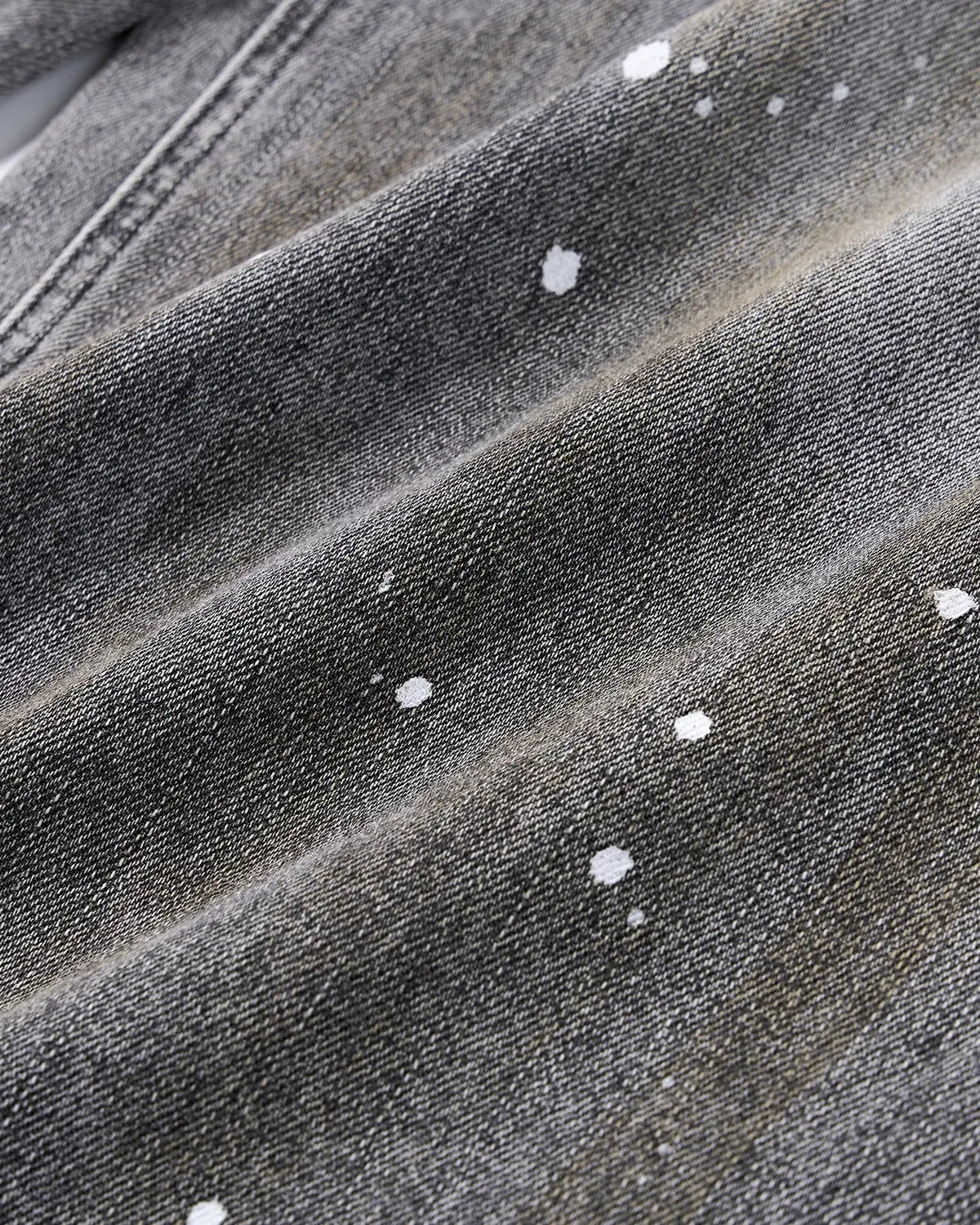 Inflation Streetwear washed barrel jeans with metal clasp, featuring a relaxed fit and distressed denim style.