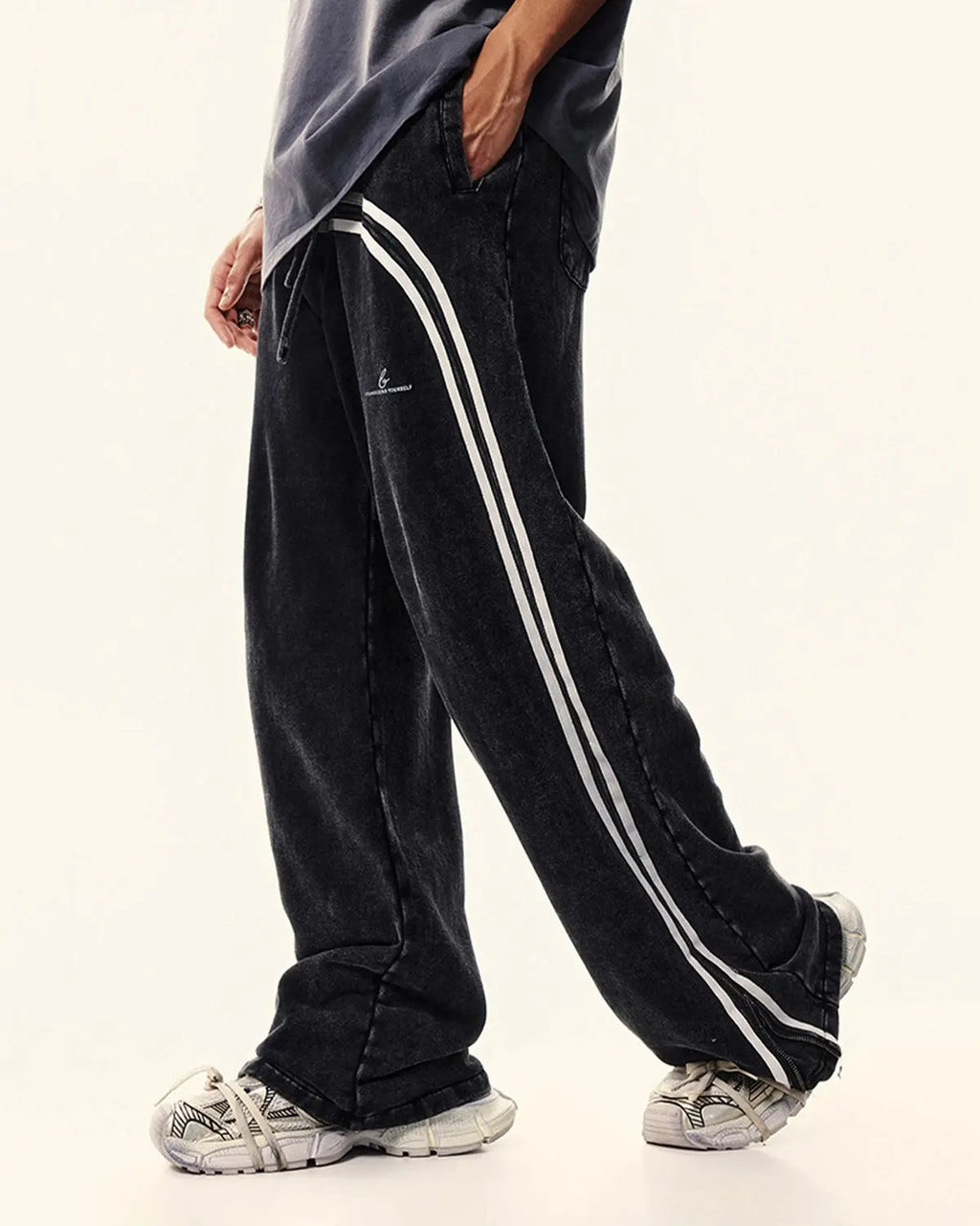 Washed ribbon wide leg sweatpants by Flation Streetwear, showing their relaxed fit and soft fabric in a casual street style.