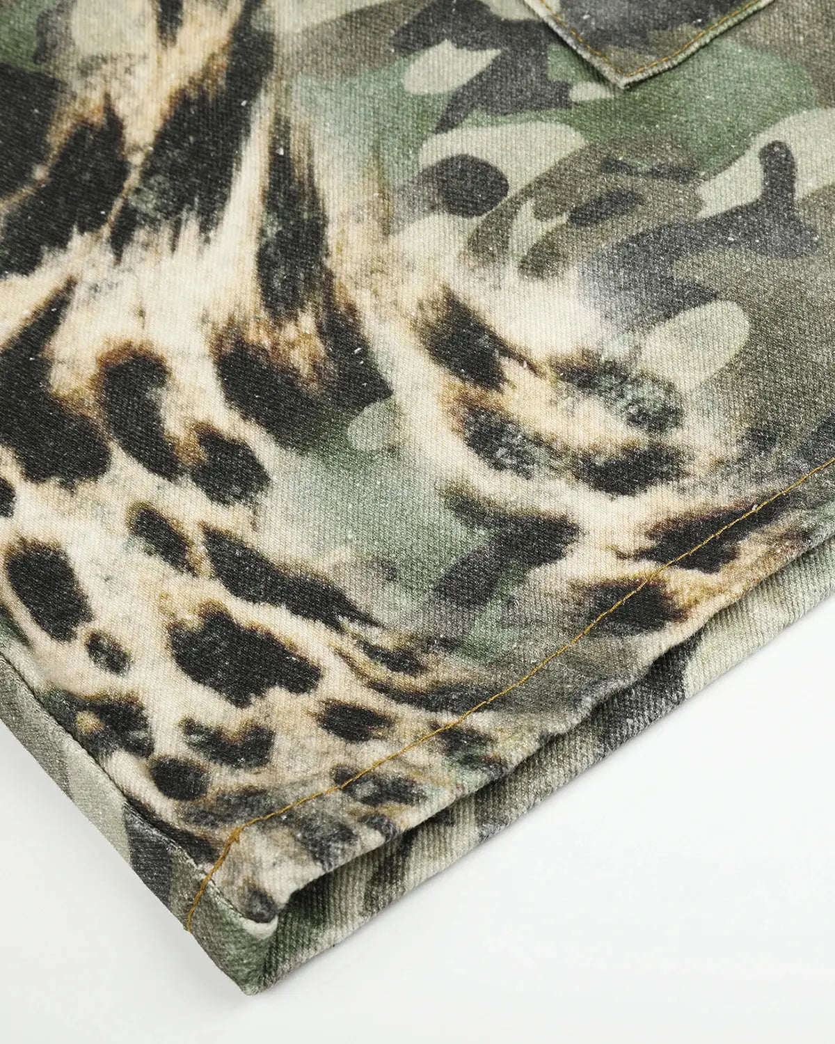 Leopard camo cargo longline shorts by INFLATION featuring a bold camo print, relaxed fit, and extended length for streetwear style.