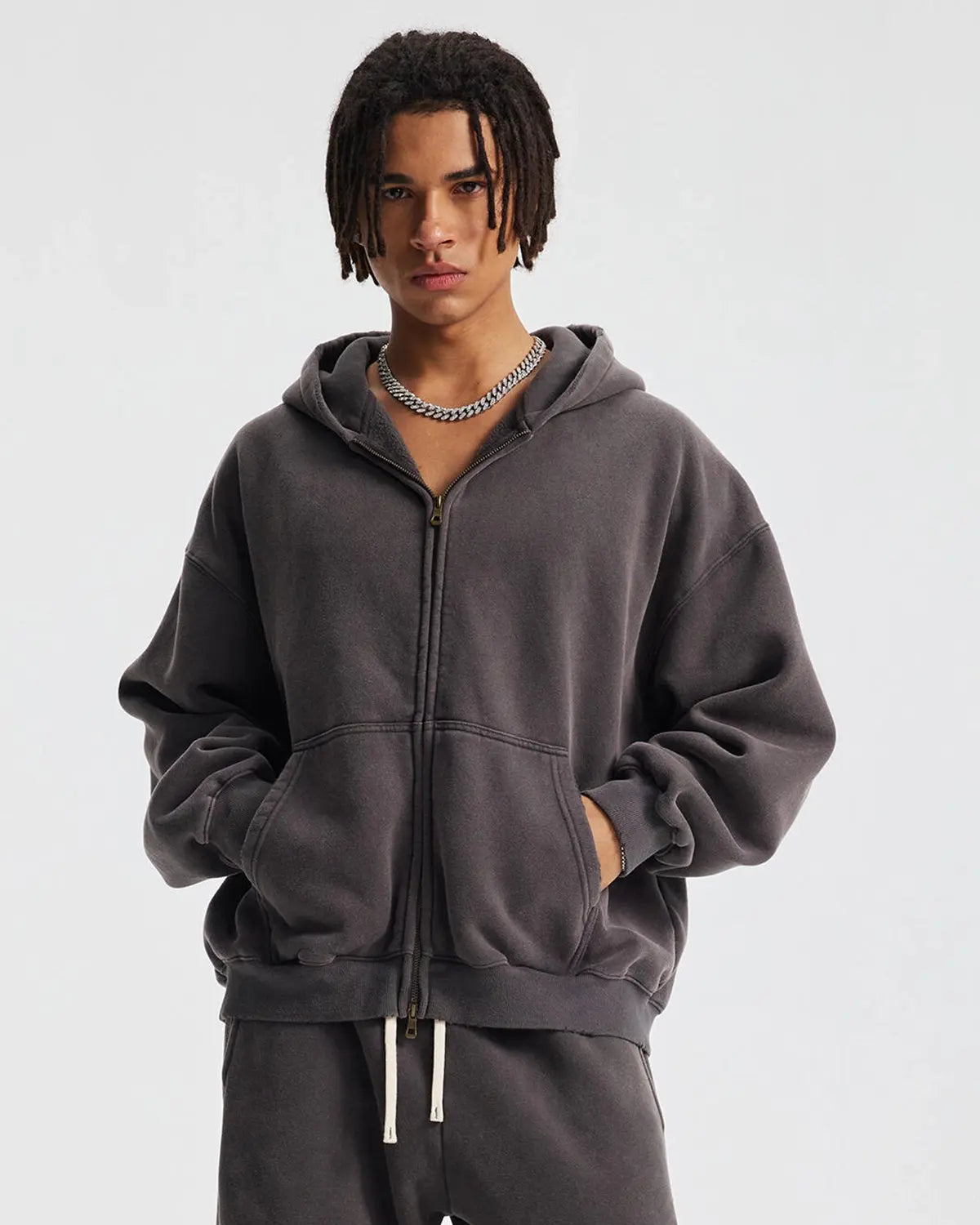 Boxy fit acid washed fleece zip-up hoodie by Flation Streetwear, featuring a relaxed fit and casual streetwear style.
