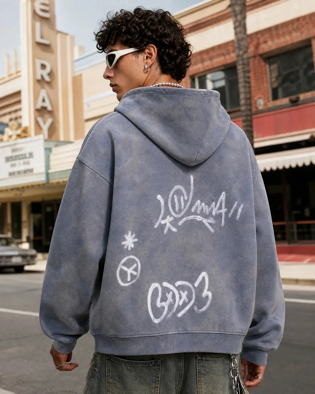 Flation Graffiti Washed Zip Up Hoodie featuring colorful graffiti design on a casual, oversized hoodie with front zipper.