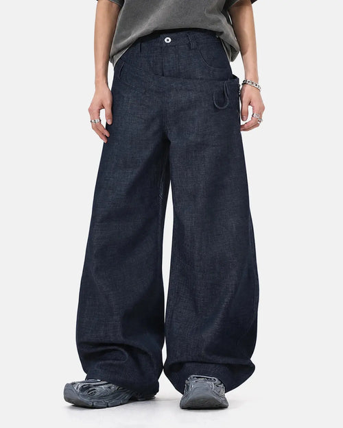 Inflation streetwear asymmetric wrap waist baggy jeans with relaxed fit and unique design, shown on a model.