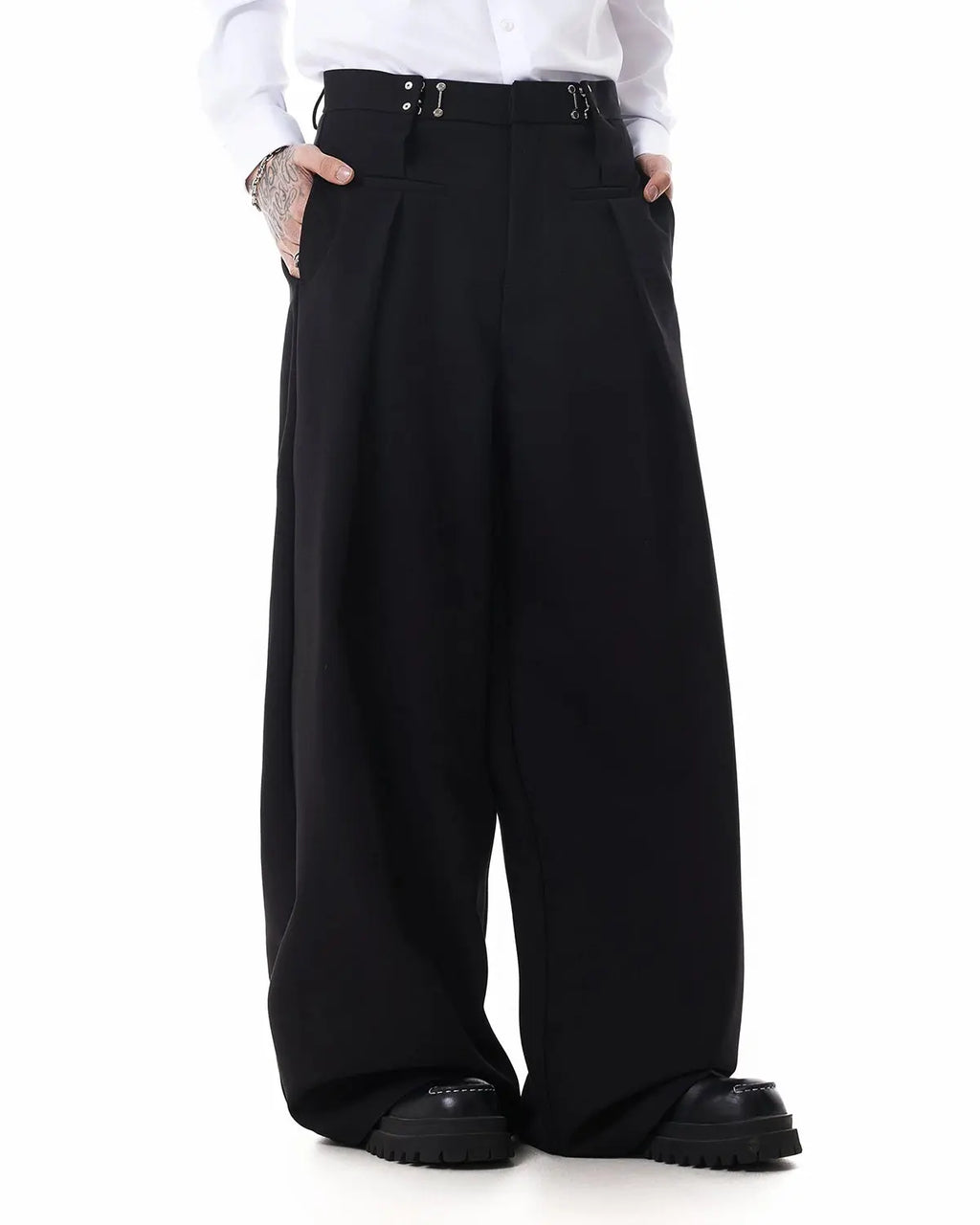 Metal hook wide-leg suit pants by INFLATION, stylish trousers with a wide-leg fit and metal hook details, shown on a model.