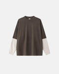 Color block long sleeve tee by Flation Streetwear featuring bold color blocking and comfortable fit on a casual model.