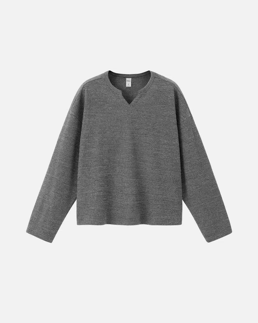 Inflation Streetwear V-neck long sleeve waffle T-shirt in neutral color, close-up showing textured fabric and fit.