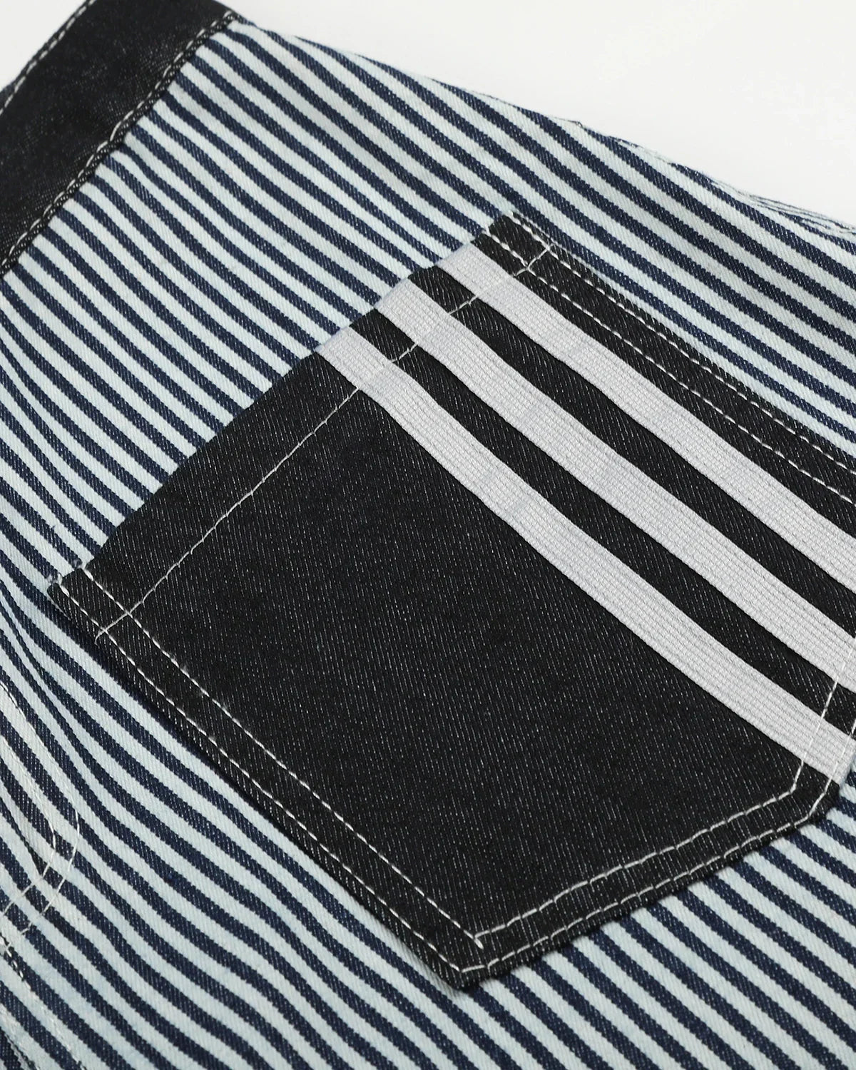 Inflation Streetwear striped patch pocket baggy jeans with relaxed fit and casual style, featuring colorful stripes and patch pockets.