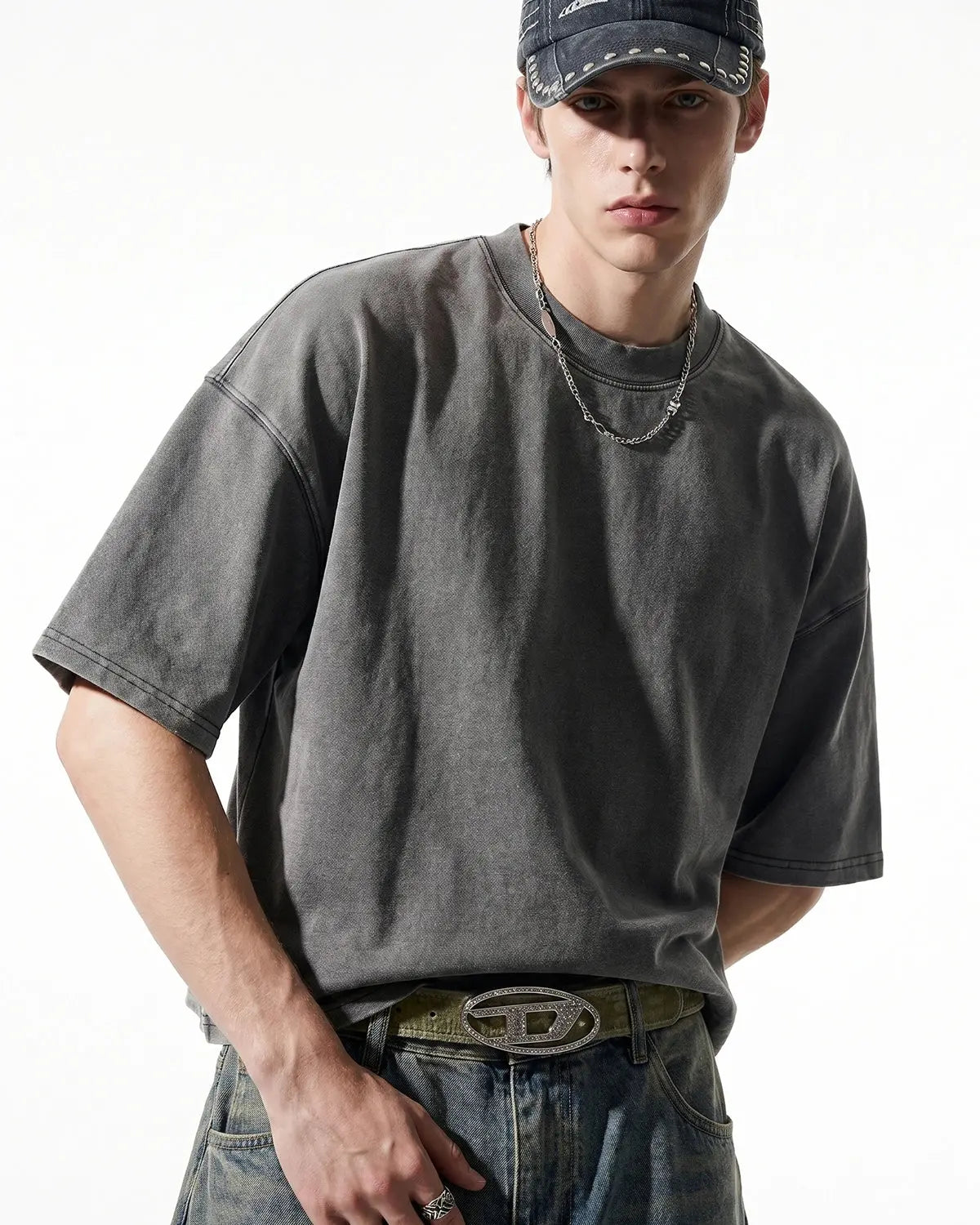 Distressed boxy washed T-shirt by Flation Streetwear, featuring a vintage-inspired, casual fit with faded, worn-in fabric.