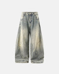 Colorful rhinestone ripped baggy jeans by INFLATION featuring distressed denim and vibrant embellishments for trendy streetwear style.