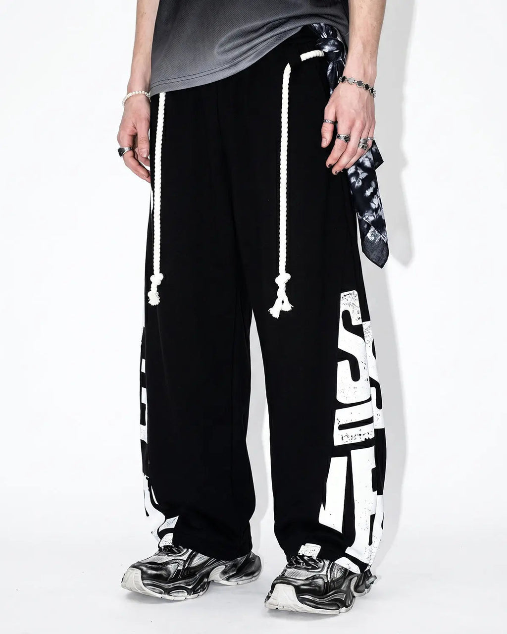 Inflation Streetwear Graphic Barrel Sweatpants with bold print, relaxed fit, and adjustable waistband on neutral background.