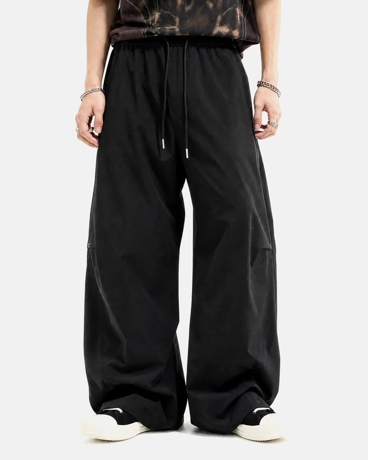 Inflation AirFlow Stretch Cooling Parachute Pants showing lightweight fabric, relaxed fit, and parachute design by INFLATION.