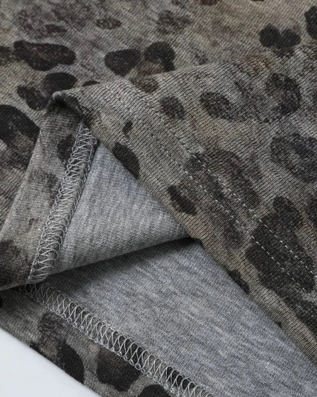 Inflation Streetwear Leopard Script Henley Baby Tee featuring leopard print and button neckline for stylish little kids.