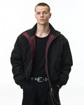 Cotton padded bomber jacket by INFLATION, streetwear style with a sleek design and quilted padding, suitable for casual wear.
