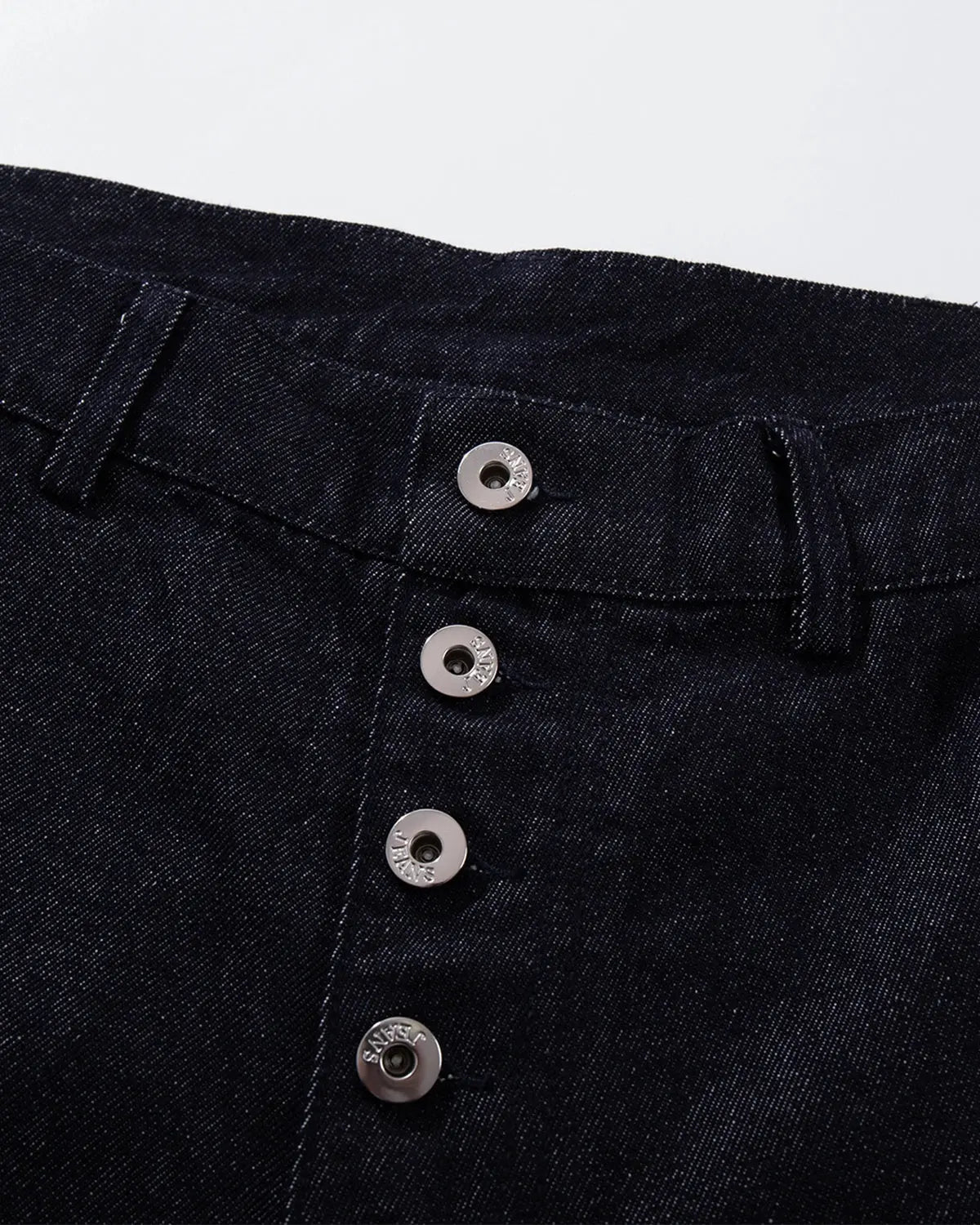 Inflation Buttons Up Raw Blue Baggy Jeans with button closure, relaxed fit, and distressed denim style.